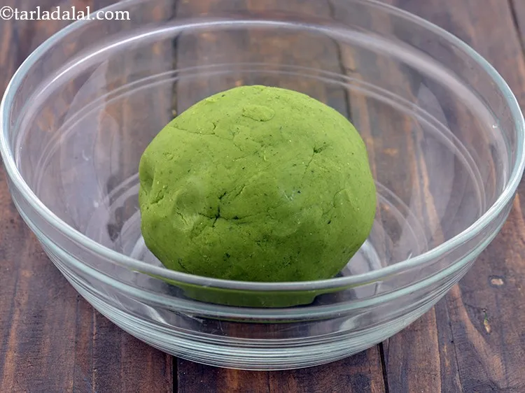 Step 21 – Knead to prepare a soft dough for the <strong>palak pudina sev</strong>.