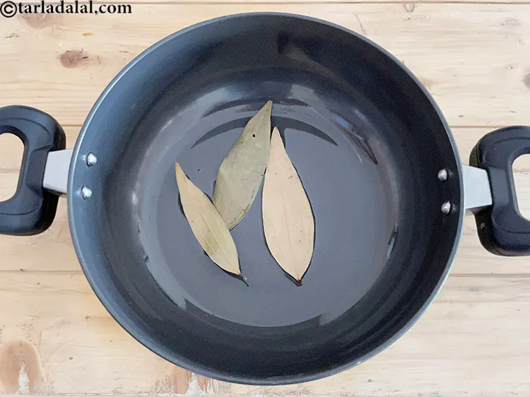 Step 20 – Add the&nbsp;<meta charset="UTF-8" />3&nbsp;<a href="glossary-bayleaf-tejpatta-tej-patta-189i">bayleaves (tejpatta)</a>.