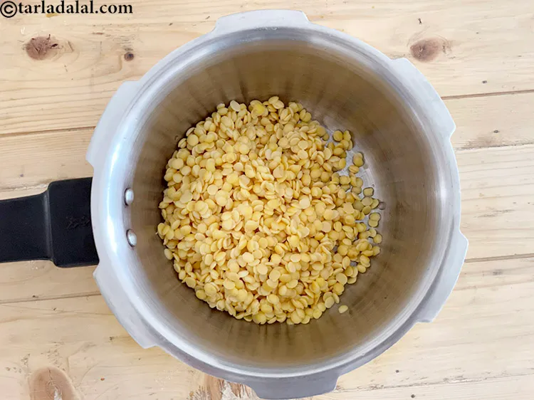 Step 8 – In a pressure cooker put&nbsp;<meta charset="UTF-8" />1/2 cup&nbsp;<a href="glossary-toovar-dal-arhar-dal-toor-dal-split-pigeon-peas-tur-dal-955i">toovar (arhar) dal</a>&nbsp;, soaked for 3 hours …