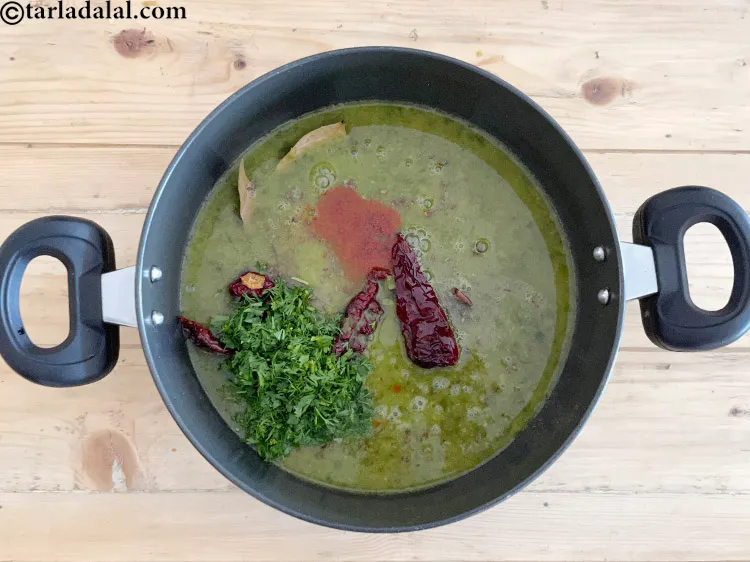 Step 29 – <meta charset="UTF-8" />Add 2 tbsp&nbsp;finely&nbsp;<a href="glossary-chopped-coriander-783i">chopped coriander (dhania)</a>.