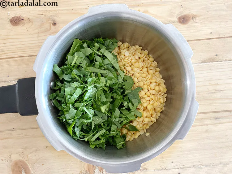 Step 9 – Add&nbsp;<meta charset="UTF-8" />2 cups&nbsp;<a href="glossary-chopped-spinach-780i">chopped spinach (palak)</a>.