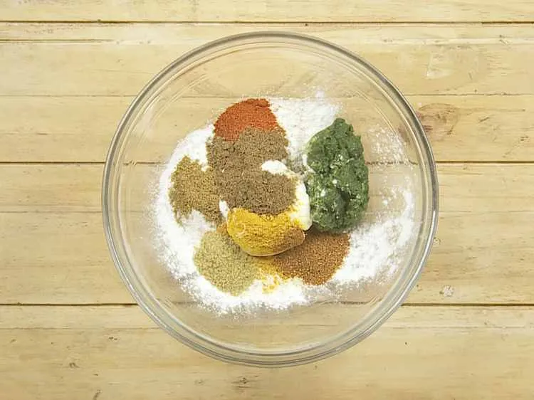 Step 34 – Add <em>tandoori masala</em> and salt. They provide a hot and spicy flavor.