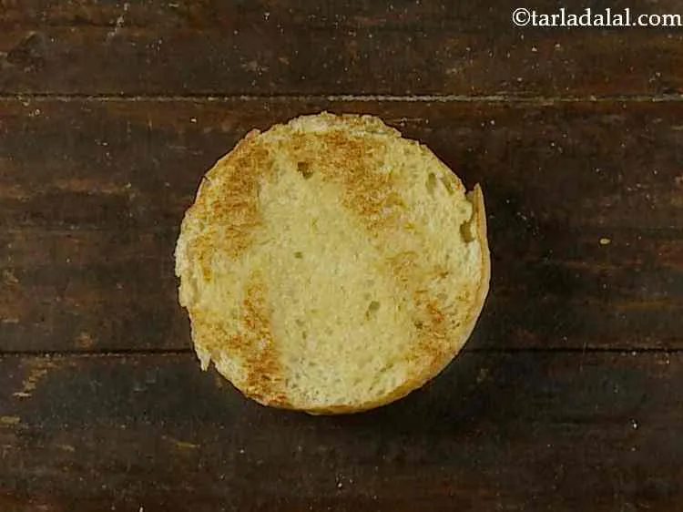 Step 17 – Place a lower half of the bun on a clean, dry surface.