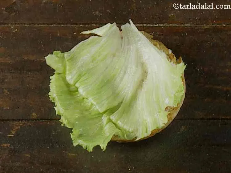 Step 19 – Place a lettuce leaf over it. This will give freshness and a light crunch.