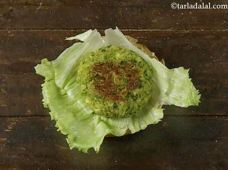 Step 20 – Over that, place a cutlet.