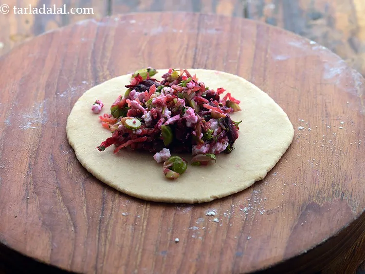 Step 18 – Place a portion of the stuffing in the centre of the circle.