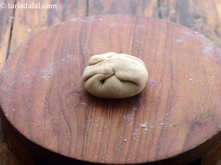 Step 19 – Bring together all the sides in the centre and seal tightly.