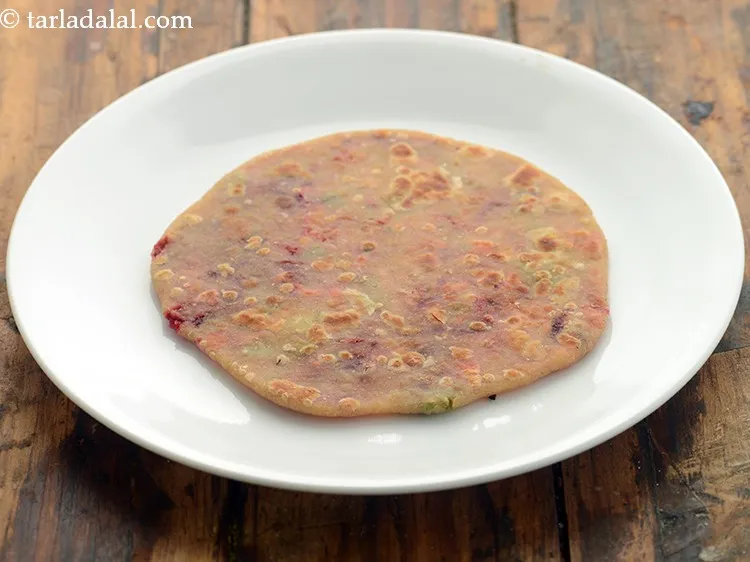 Step 24 – Cook till the paratha turns golden brown in colour from both the sides. Repeat the …
