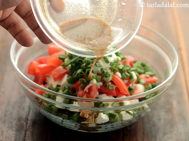 Step 20 – Pour the dressing over <strong>calcium rich paneer salad.&nbsp;</strong>