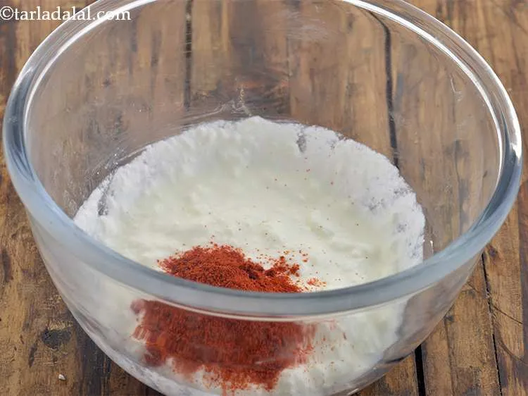 Step 3 – Add chilli powder to spice up the mixture of the cutlets.