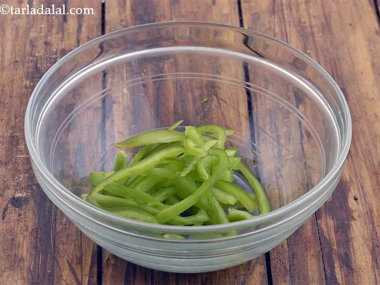 Step 44 – Take a deep bowl and put the capsicum juliennes into it. You can also use …