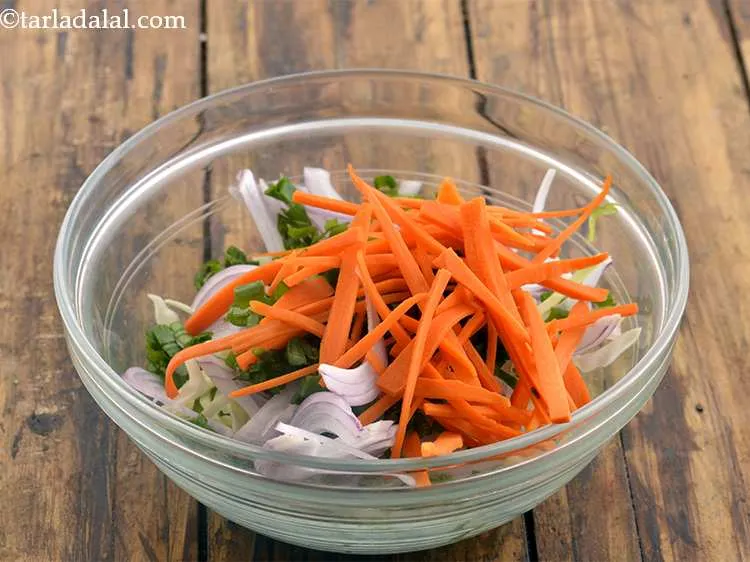 Step 48 – Add the carrot juliennes for their crispiness and mild sweetness.