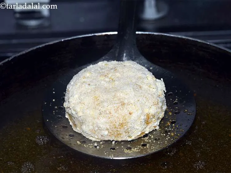 Step 29 – Heat the oil in a kadhai to deep fry the cutlets.