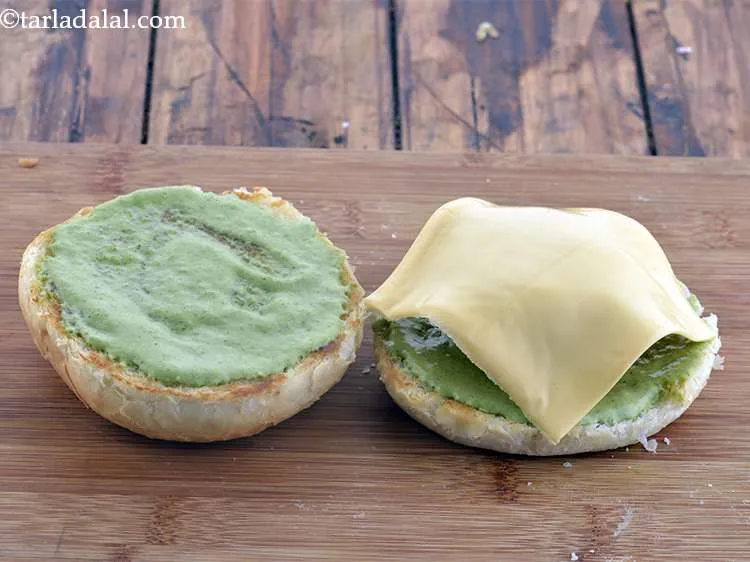 Step 57 – Now, place a slice of cheese over it.