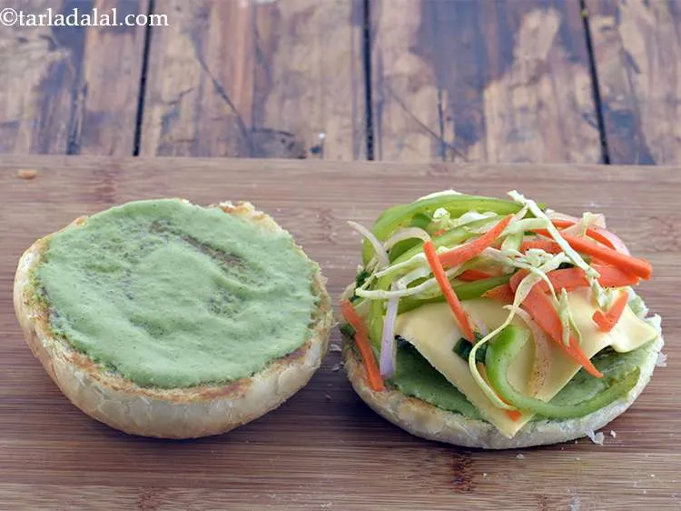 Step 58 – Spread 1 tbsp of salad.