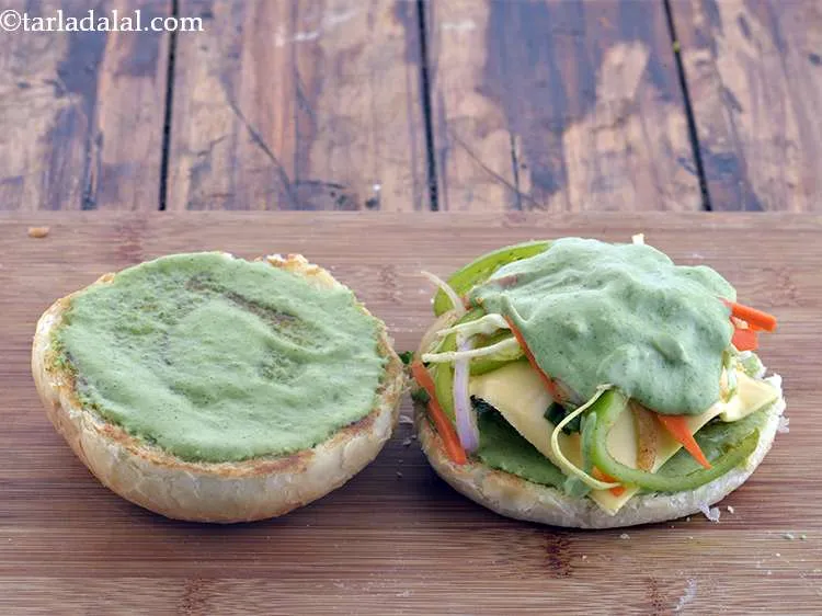 Step 59 – Spread 1 tbsp of the minty-mayo spread evenly over the salad.