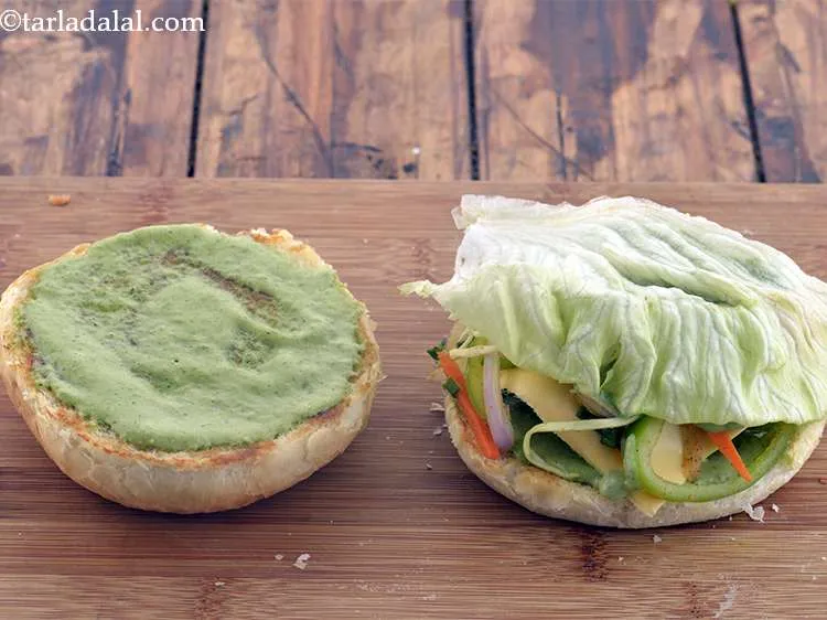 Step 60 – Finally, place a lettuce leaf on the <strong>paneer burger</strong>.