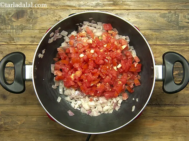 Step 31 – Add the tomatoes. Avoid unripe tomatoes as they will affect the taste of the dish, …
