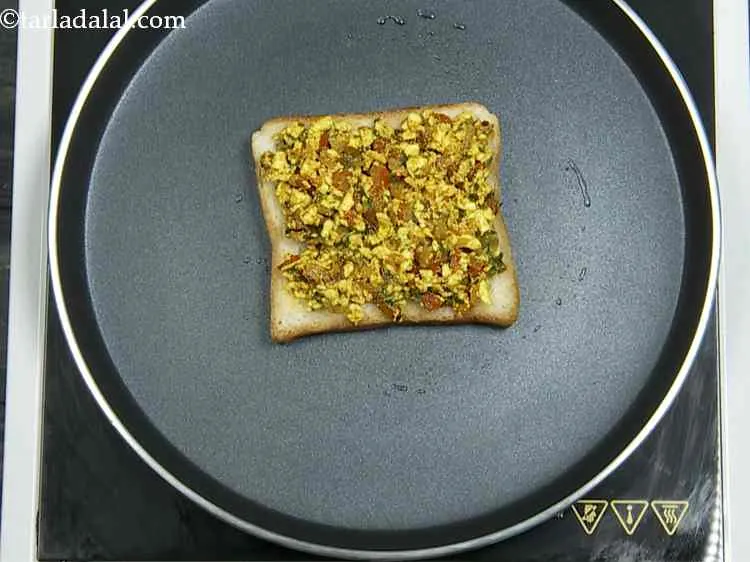 Step 12 – Turn the flame to the lowest or simply switch it off and place a portion …