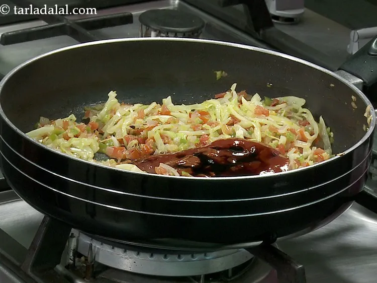 Step 18 – Add soya sauce.