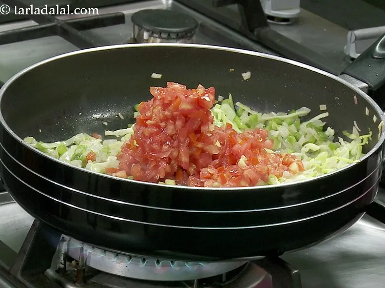 Step 14 – Add the tomatoes.
