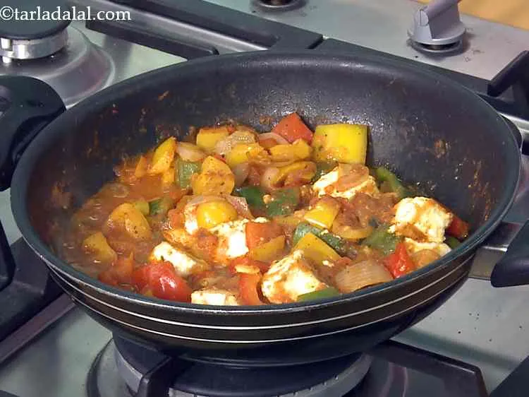 Step 8 – Add the paneer and salt, mix gently and cook on a medium flame for 1 …