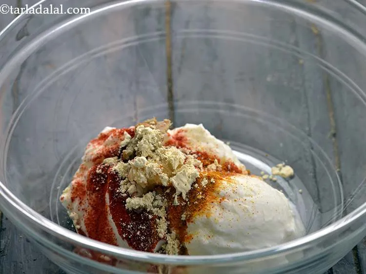 Step 21 – Add the besan. Besan helps in binding and coating the spices well to the paneer …