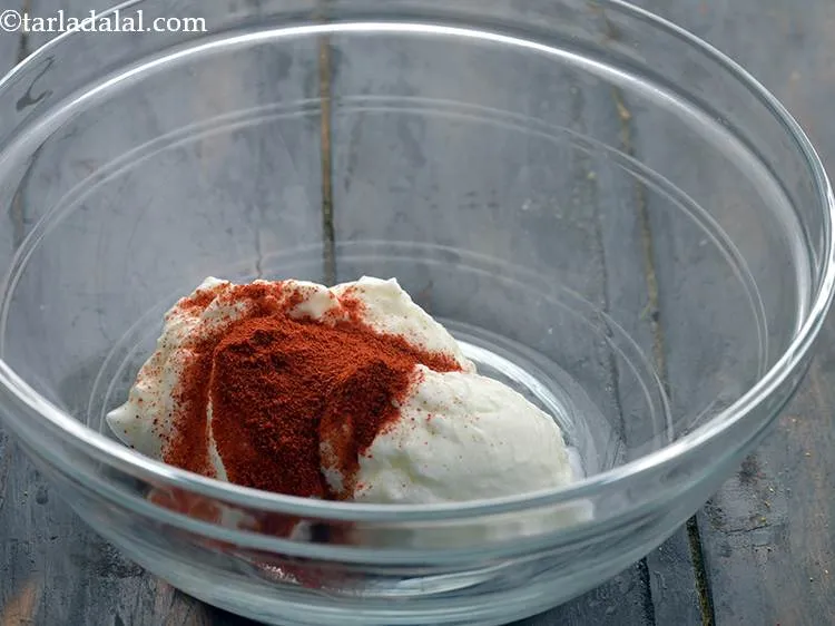 Step 18 – Add the chilli powder. Also, you can take half and half Kashmiri red chilli powder …