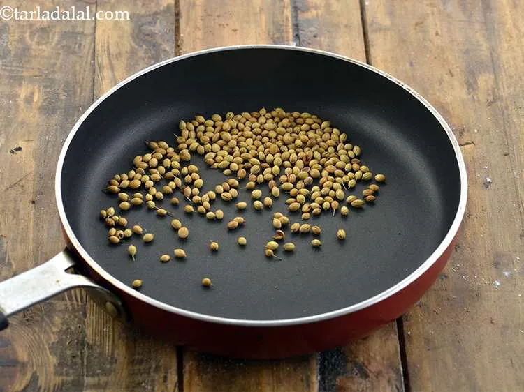 Step 2 – Heat a small broad non-stick pan and add the whole coriander seeds to it and …