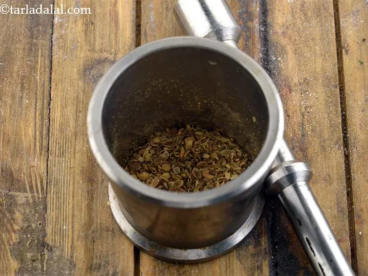 Step 26 – Add the coriander seeds to a mortar and crush them with a pestle. The roasting …