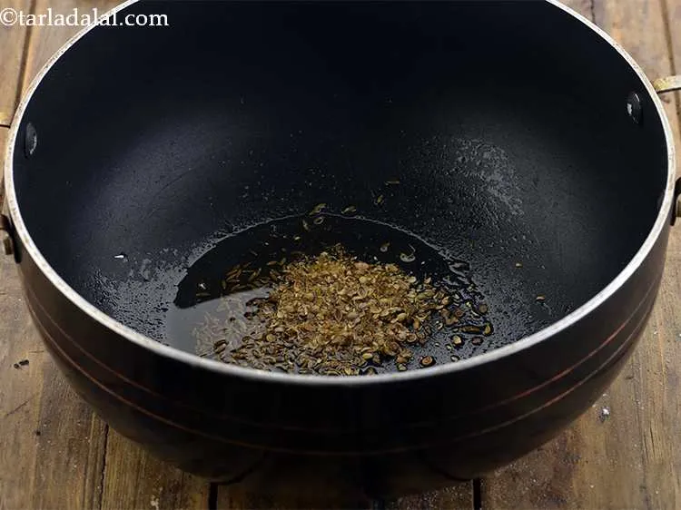 Step 6 – Then add the crushed coriander seeds.
