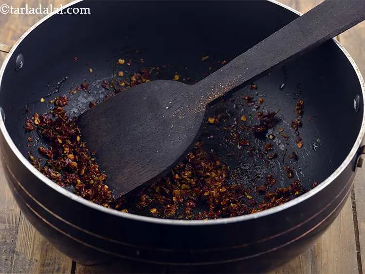Step 9 – Mix well and saute for 30 seconds till the spices lose their rawness.