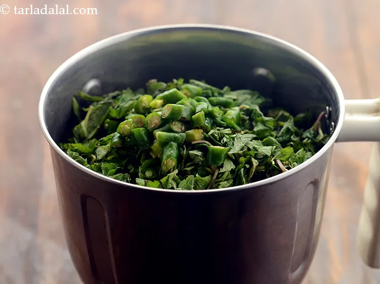 Step 4 – Add roughly chopped green chillies. Add more or less as per the spice level you …