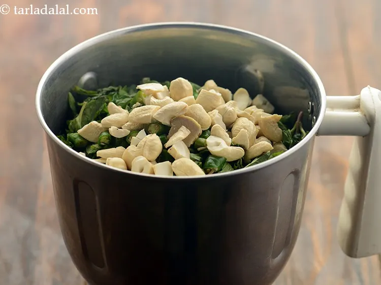 Step 6 – Add broken cashewnuts. It gives a mildly sweet and creamy flavor to the paneer makhmali …