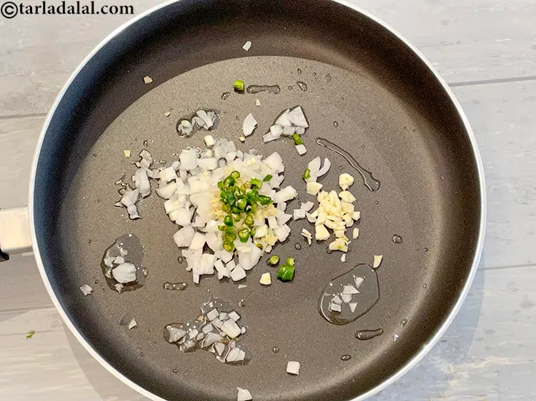 Step 6 – Add the green chillies.