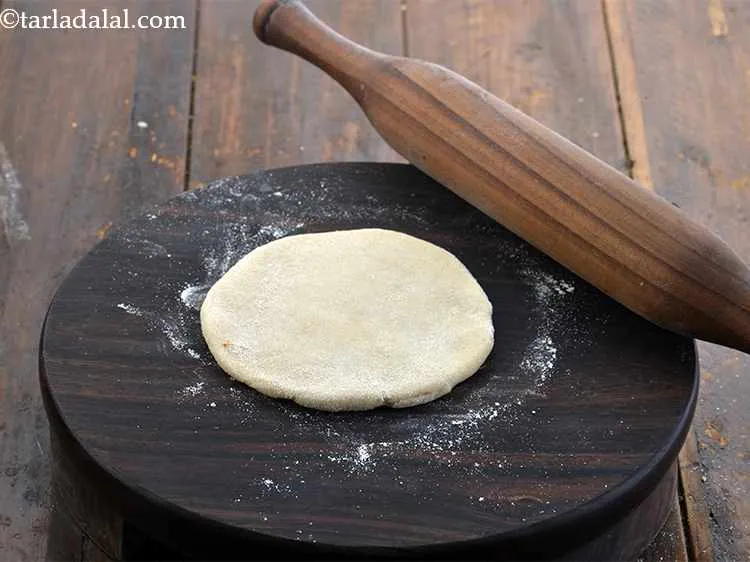 Step 17 – Roll out one portion of the dough into a 75 mm. (3&rdquo;) diameter circle using …