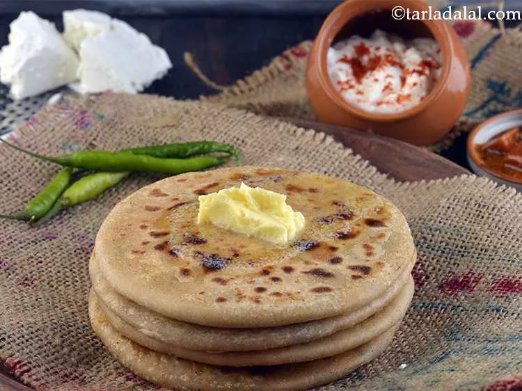 Step 26 – Serve&nbsp;<strong>Punjabi</strong>&nbsp;<strong>Paneer Paratha</strong>&nbsp;hot with cold&nbsp;&nbsp;<a href="https://www.tarladalal.com/Basic-Homemade-Curd-Dahi-Or-Yogurt-Using-Cows-Milk-42457r">homemade curds using cows milk</a>&nbsp;or&nbsp;<a href="https://www.tarladalal.com/Low-Fat-Curds-(-How-To-Make-Low-Fat-Curds)-8687r">low fat curds</a>&nbsp;or with a <a …