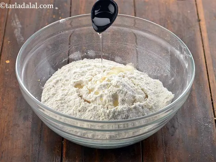 Step 3 – Then add the oil and salt to taste. Mix it very well with your fingertips.