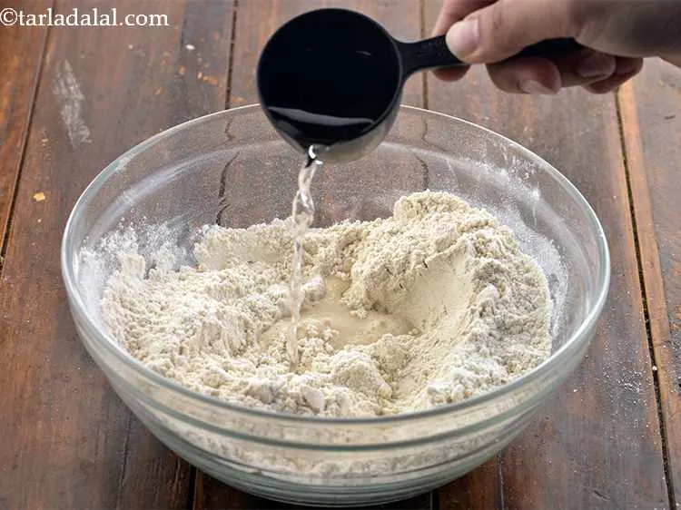 Step 4 – Slowly add water and combine all the ingredients. We have used approximately 1/2 cup of …