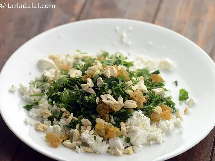 स्टेप 6 – काजू डालें।