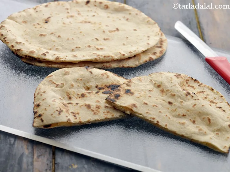 Step 25 – Cut each pita bread into 2 halves. Keep aside.