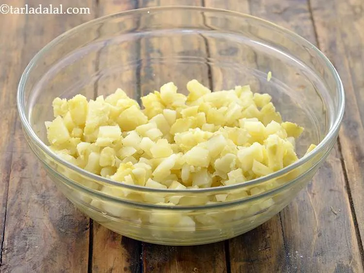 Step 14 – We will now add all the remaining ingredients. Starting with, potatoes.