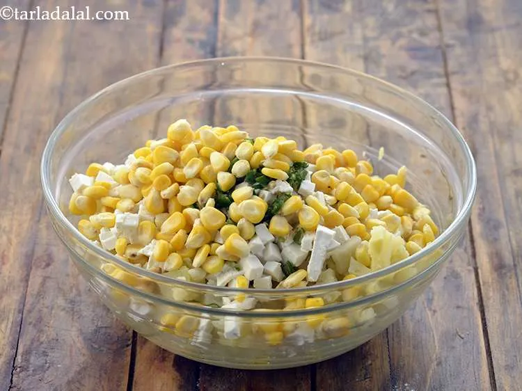 Step 17 – Add the boiled corn kernels. The corn kernels can also be crushed coarsely before adding …