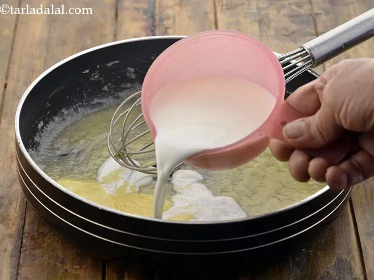 Step 11 – When the flour turns slight golden, add the milk.