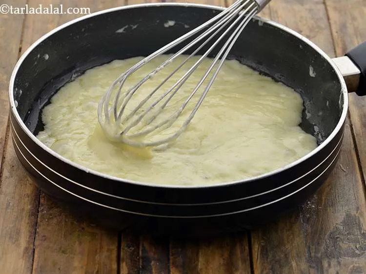 Step 12 – Mix well with the help of a whisk and cook on a medium flame for …