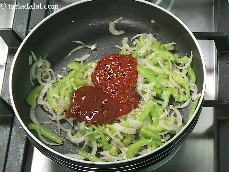 Step 8 – Add tomato ketchup for a tangy flavour.