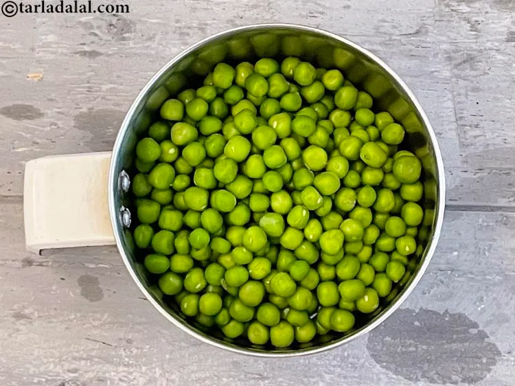 Step 3 – In a mixer, put&nbsp;<meta charset="UTF-8" />1 cup&nbsp;<a href="glossary-green-peas-matar-hare-matar-vatana-180i">green peas</a>. Note that these are raw green …