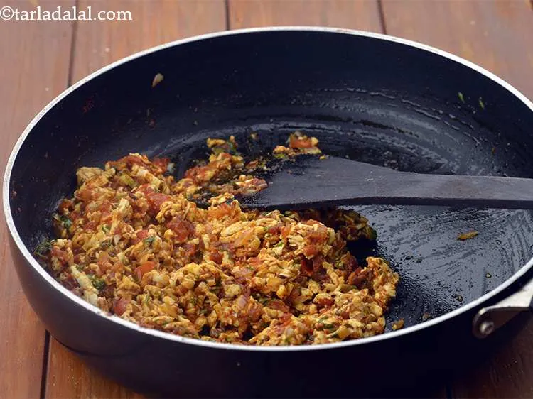 Step 9 – Add the coriander, mix well cook on a medium flame for 2 minutes, while stirring …