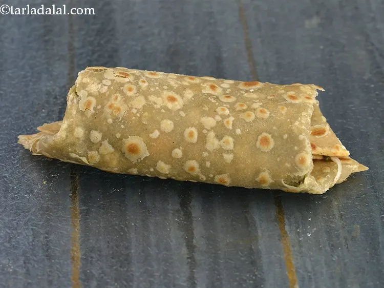 Step 32 – Roll it up tightly from one end to another end of the chapati. You can …