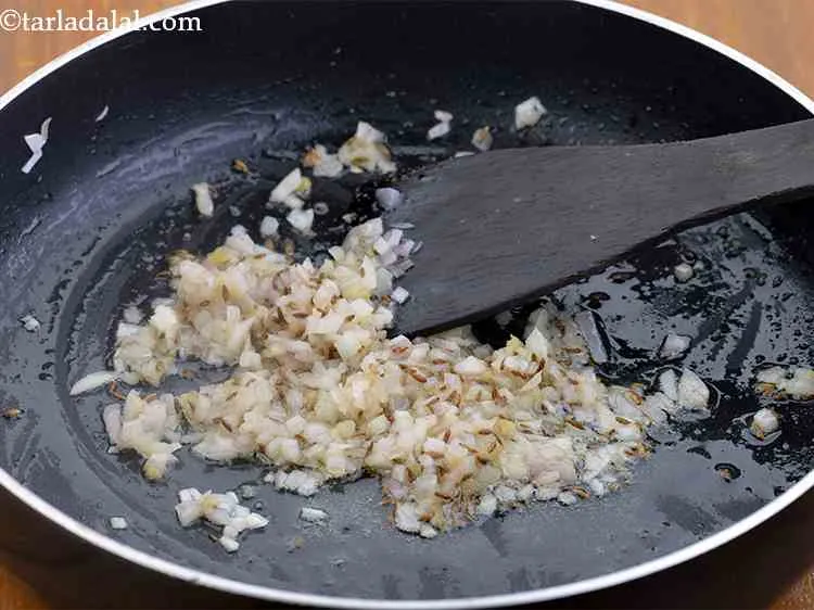 Step 2 – When the seeds crackle, add the onions. This paneer topping in just like the paneer …